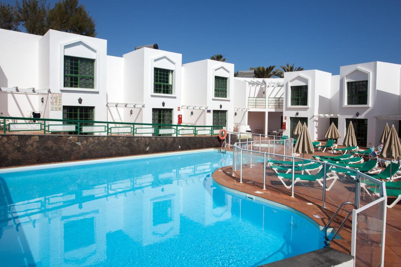 LiggingTAO Caleta Playa ligt direct aan het zandstrand van Corralejo Bay