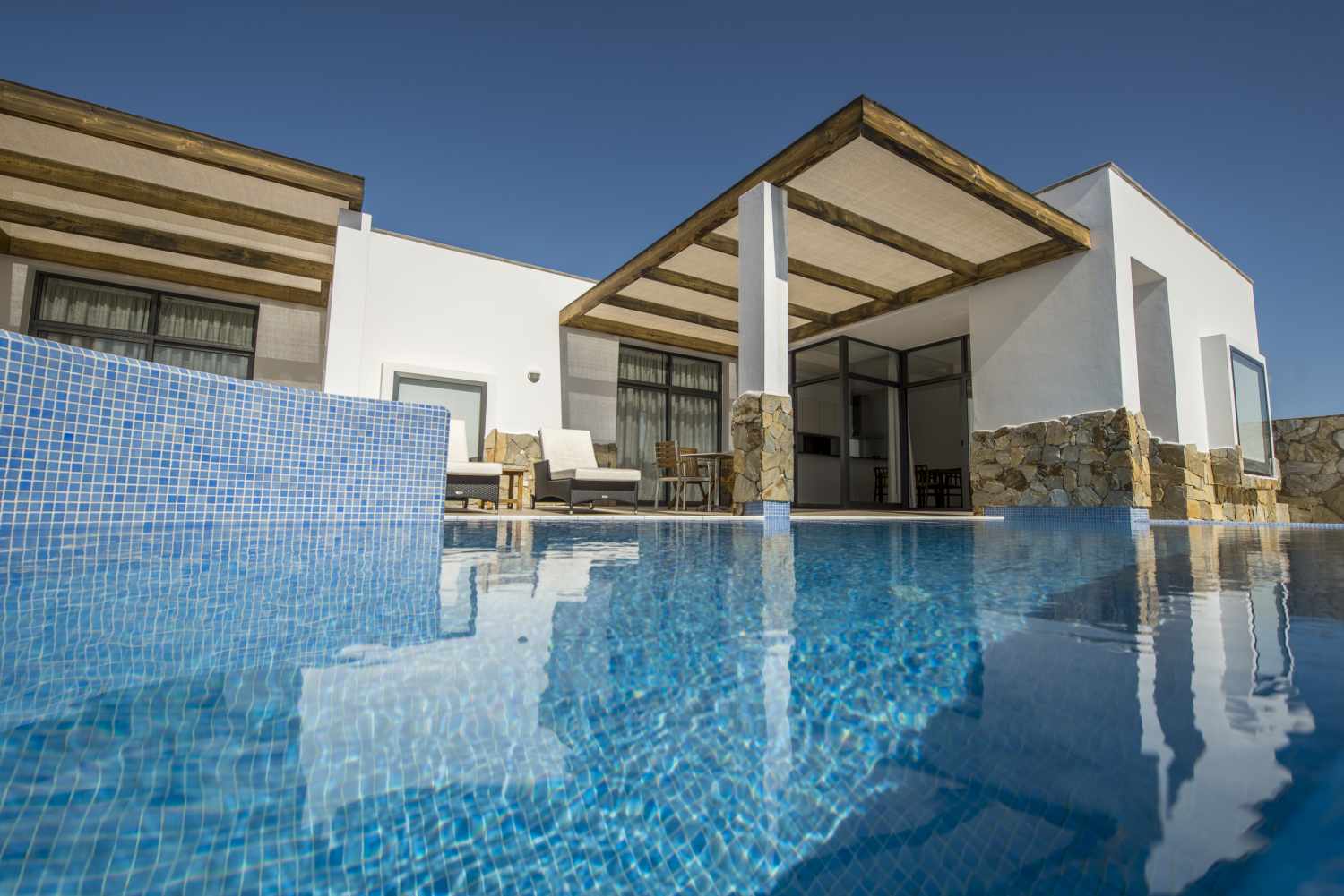 LiggingPlayitas Villas ligt in de rustige en natuurlijke baai Las Playitas op het eiland Fuerteventura. De 24 villa's liggen op de achterste hellingen van de baai